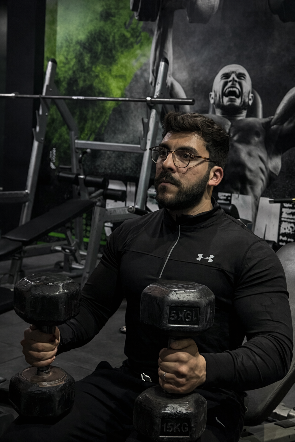 Coach Omar flexing
